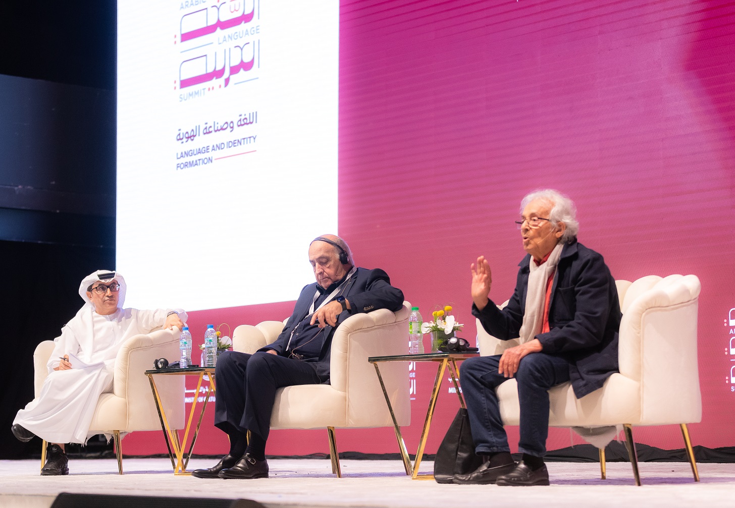 Within a cultural session held within the activities of the first day of the  Arabic Language Summit Adonis and Gilbert Sinoué discuss the impact of language on human identity and creativity